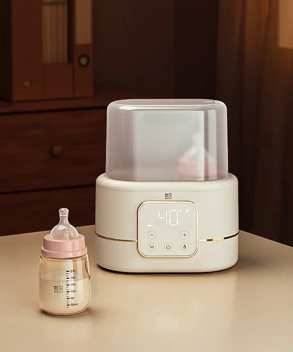NCVI double bottle warmer + sterilizer.