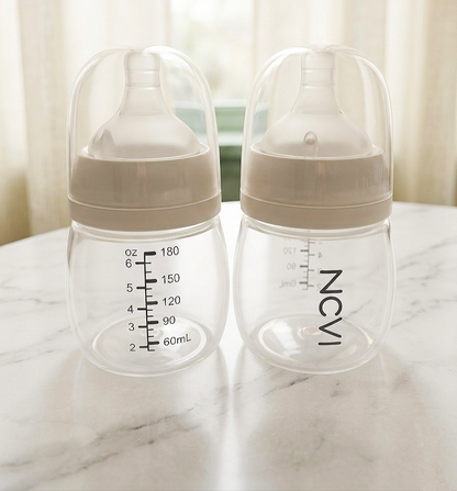 NCVI Wide-Neck plastic Feeding  Bottle.