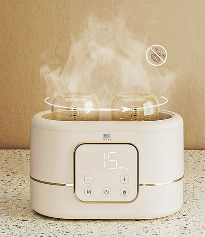NCVI double bottle warmer + sterilizer.