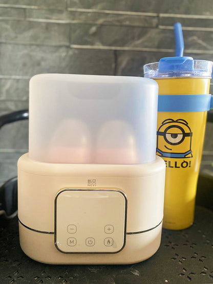 NCVI double bottle warmer + sterilizer.
