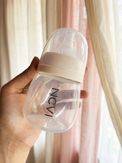NCVI Wide-Neck plastic Feeding  Bottle.