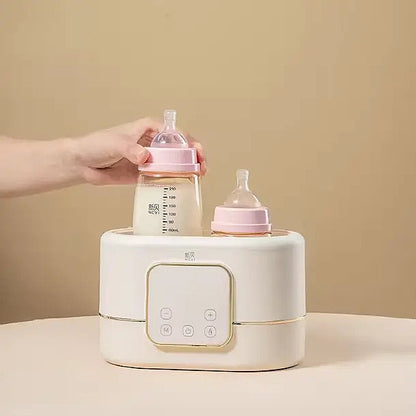 NCVI double bottle warmer + sterilizer.